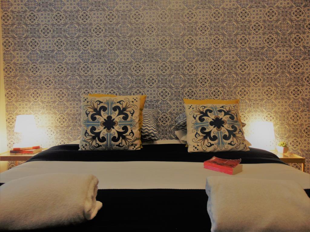 Pensión Tiles *